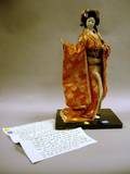 Japanese Porcelain Doll with Traditional Brocade Costume