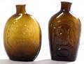 Two Blown Molded Amber Glass Half Pint Flasks