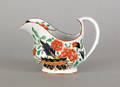 Gaudy Dutch war bonnet creamer 19th c