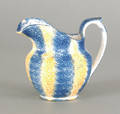 Yellow and blue rainbow spatter creamer 19th c