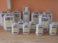 Set of Twelve Czechoslovakian Gilt and Transfer Decorated Ceramic Pantry Canisters and an oil pitcher