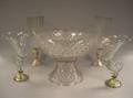 Pair of Sterling Silver Mounted Molded Colorless Glass Cornucopias a Colorless Pressed Glass Pedestal Punch Bowl and a Pair of Hurrica