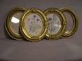 Pair of Oval Gilt Framed Floral Prints and an Oval Giltwood Mirror