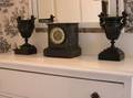 ThreePiece French Victorian Black Marble and Patinated Metal Clock Garniture