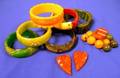 Six Bakelite Bracelets and a Brooch Together with a pair of shoe clips