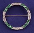 Art Deco Platinum Emerald and Diamond Circle Brooch