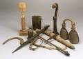 Eleven African Carved Wood or Metal Items