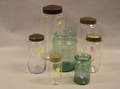 Seven Clear and Aqua Blown Glass Food Jars