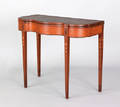 Exceptional and rare Philadelphia Federal satinwood veneered mahogany games table ca 1795