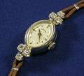 Ladys 14kt Gold and Diamond Wristwatch