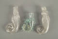 Three seahorse scent bottles