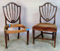 Two Hepplewhite mahogany shieldback dining chairs
