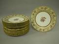 Set of Twelve Limoges Gilt and Floral Decorated Porcelain Dinner Plates