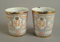 Two Russian enameled coronation souvenir cups for Czar Nicholas II