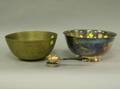 Chinese Brass Fruit Bowl a Silver Plated Presentation Revere Bowl and a Sterling Silver and Ebony Tea Strainer