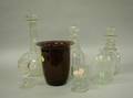 Three Colorless Glass Decanters Small Glass Whiskey Flask with Tree a Ruby Glass Vase and Two Glasses