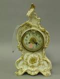 French Rococostyle Gilt Decorated Porcelain Chime Mantel Clock