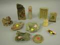 Eleven Asian Carved Soapstone Items and a Carved Ivory Buddha
