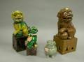 Three Chinese Glazed Ceramic Foo Dogs and a Celadon Glazed Foo Dog Incense Burner