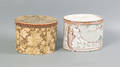 Two wallpaper covered hat boxes mid 19th c