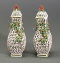 Pair of Continental Porcelain Covered Urns