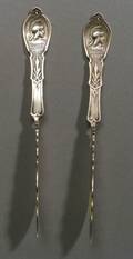 Pair of Coin Silver Medallion Master Butter Knives