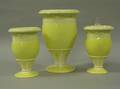 Set of Three Wedgwood Yellow and White Embossed Queens Ware Vases