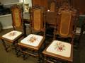 Set of Six Renaissance Revival Caned and Needlepoint Upholstered Carved Oak Dining Chairs