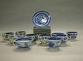 Twenty Nanking and Canton Blue and White Porcelain Teacups and Saucers