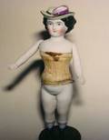 Small Hatted Parian with Squeaker in Torso