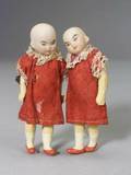 Pair of Small Oriental Bisque Head Dolls