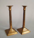 Pair of English bell metal columnar candlesticks late 18th c