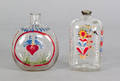 Two Stiegel type enamel decorated bottles 19th c