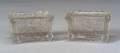 Two Colorless Pressed Lacy Glass Eagle Pattern Salts