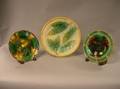 Two Wedgwood Majolica Plates and a Majolica Leaf and Basketweave Charger
