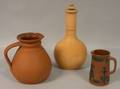 Wedgwood Rosso Antico Lidded Bottle and Two Jugs