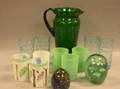 Ten Colored Art Glass Tumblers a Pitcher and Two Paperweights