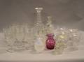 Approximately Twentyseven Colorless Pressed and Cut Glass Water Goblets and Table Items