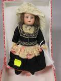 Small German Porcelain Head Doll with Composition Body