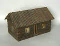 Miniature folk art log cabin