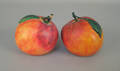 Pair of carved and painted apples ca 1900