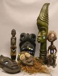 Seven African Carved Wooden Masks and Figures