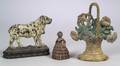 Three Painted Cast Iron Doorstops and a Brass School Bell with Wooden Handle