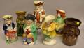 Seven Assorted Glazed and Decorated Ceramic Toby Jugs