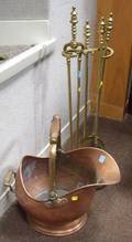 Brass Mounted Copper Helmet Coal Scuttle and a Set of Three Brass Fireplace Tools with Stand