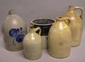 Four Stoneware Jugs and a Crock