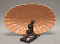 Catalina Pottery Glazed Shellform Bowl and a Nuart Art Deco Patinated Metal Figure of a Seated Female Nude