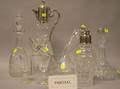 Nine Colorless Cut Glass Decanters and Twelve Colorless Cut Glass Stems