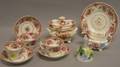 NinePiece English Floral Decorated Ceramic Partial Tea Set and a German Porcelain Tea Bell