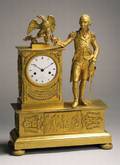 A Neoclassical CastBrass and MercuryGilded Mantel Clock